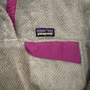 Women Patagonia fleece top. Have 2 side pockets . Like new condition
